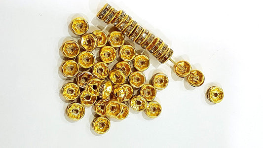 rakhi gold spacer  beads  pack of 100pc