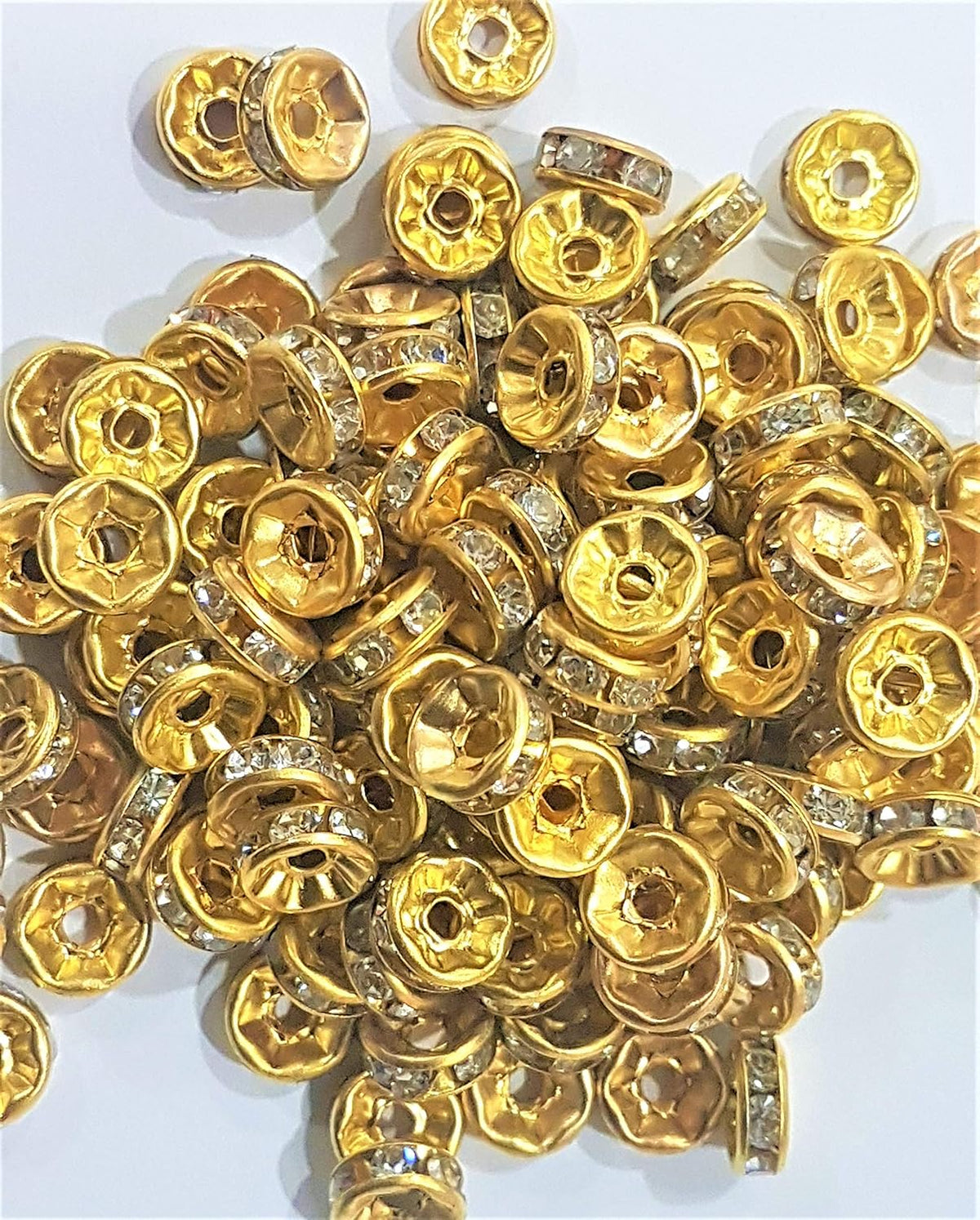 rakhi gold spacer  beads  pack of 100pc